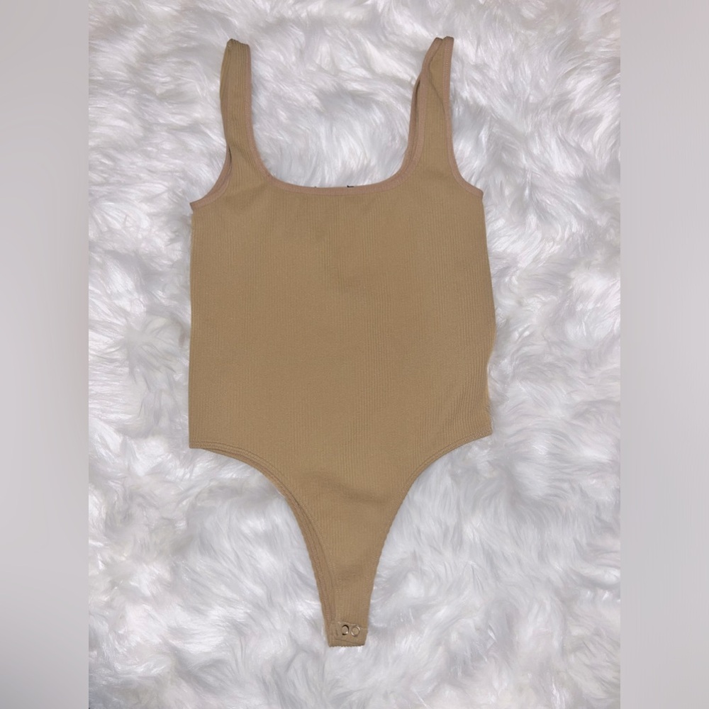 Tan Body suit